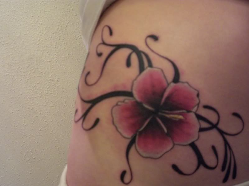 hip bone tattoo. i have one on my pelvic bone