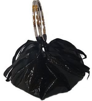 ClaudiaCanovaBlackWristBag.jpg