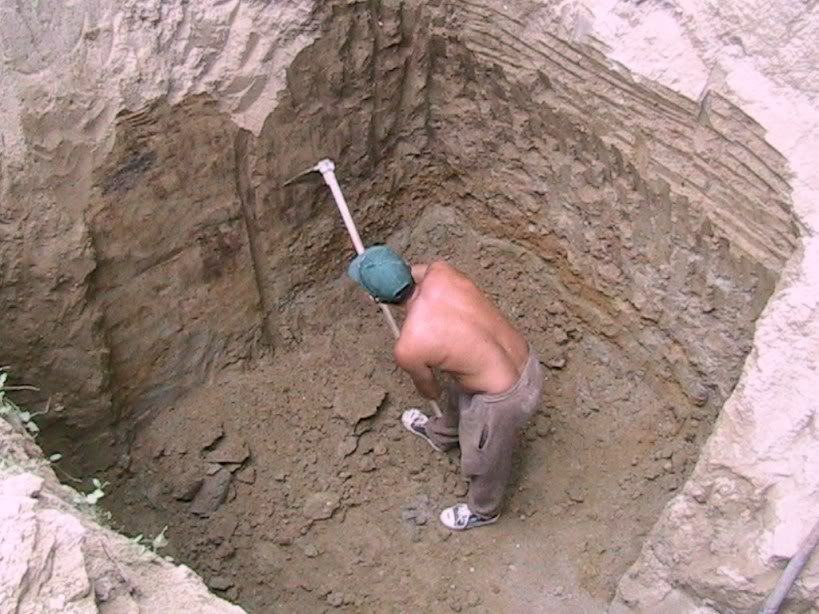 Boy Digging Hole