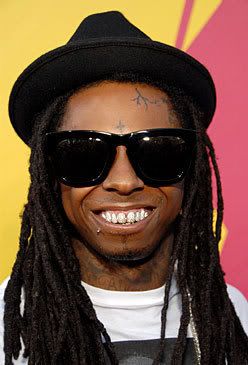 http://i199.photobucket.com/albums/aa33/caitland11/lil-wayne-82708455_getty.jpg