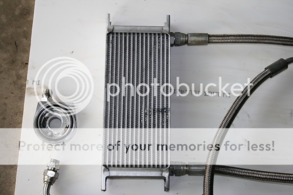 MI random parts navan r33 seat, oil cooler, 5 lug rear hubs, etc